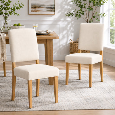 Chaise rembourrée à dossier en bois massif