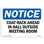 Coat Rack Ahead in Hall outside Meeting Room Sign