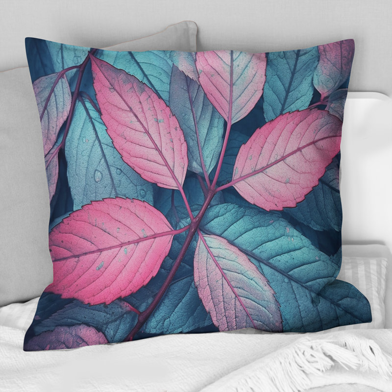 Coussin rose à imprimé floral feuille de splendeur rose