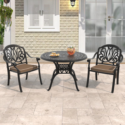 Ensemble de salle à manger de patio rond pour 2 personnes (100 cm) avec trou pour parasol, 2 chaises empilables avec coussins bruns