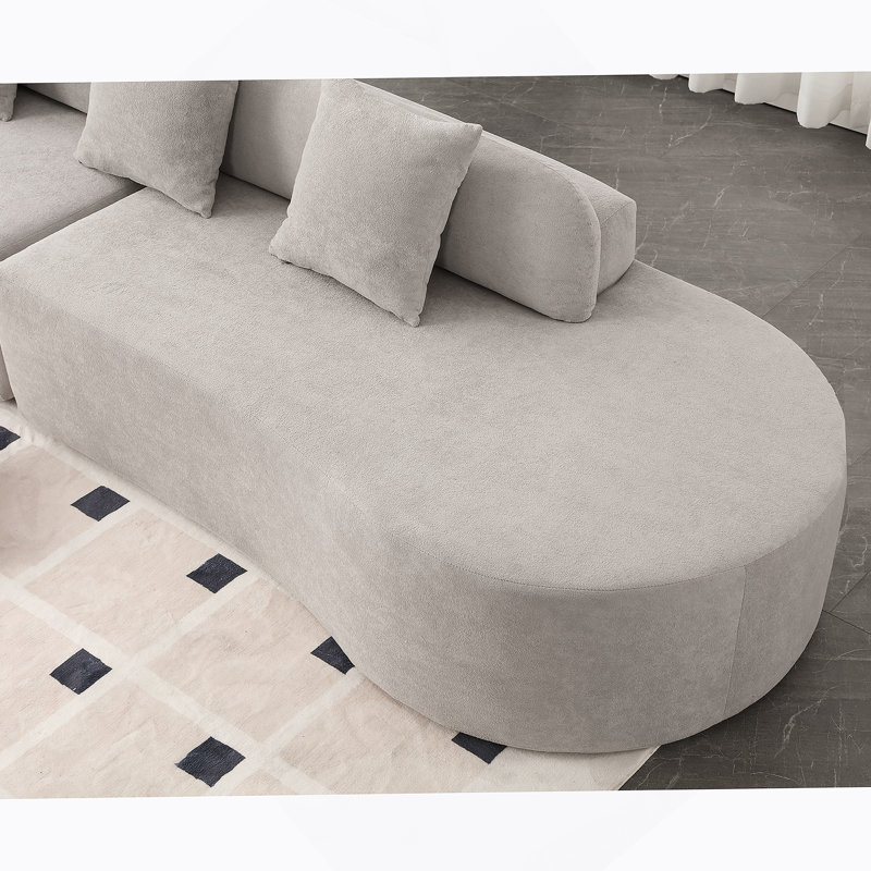 Canapé minimaliste incurvé avec tissu éponge pour le salon, confortable et élégant