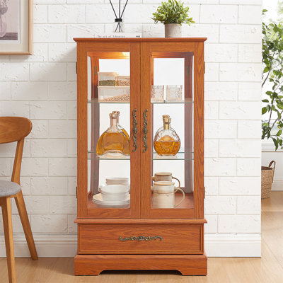 Lighted Curio Display Cabinet With Adjustable Glass Shelves, 2 Doors And 1 Drawer For Elegant Home Showcase.
