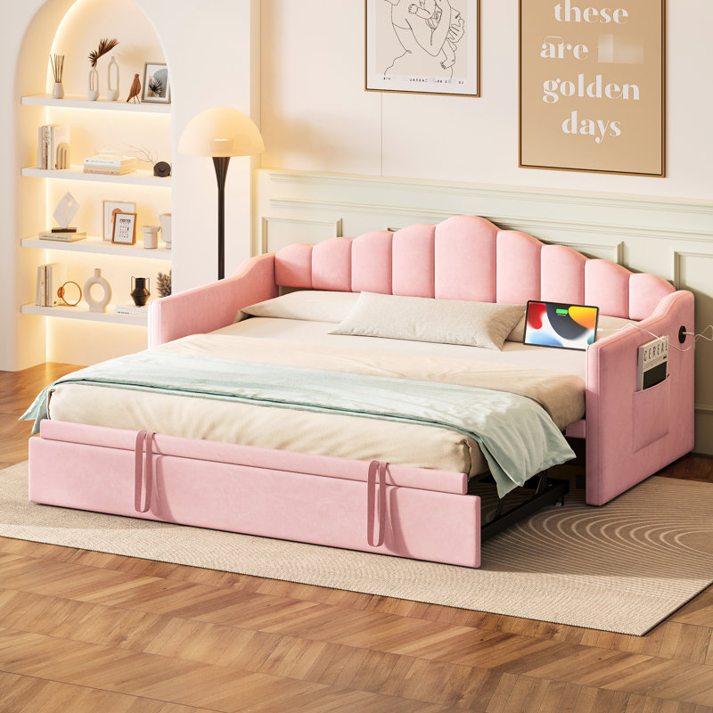 Lit de jour simple rose rembourré en velours doux, avec couchette escamotable, et charge de type C, et poches latérales pour les livres