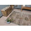 Tapis turc beige parfait pour un salon de style bohémien qui nécessite un tapis Oushak