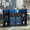 Armoire de table de bar Kodeah de 62,99 po avec DEL et tiroir, mini bar à liqueur avec rangement à 8 niveaux et porte-verres à pied, support de bar à vin avec porte en verre et support à vin réglable, comptoir en forme de croissant pour pub