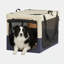 Cage de voyage Canine avec une housse en tissu réglable supportée par un cadre de tuyau en fer spiralé, des coutures renforcées et une conception à 3 portes
