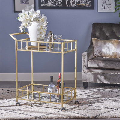 Chariot-bar élégant et fonctionnel avec plusieurs tablettes pour faciliter l'organisation des boissons et des collations, parfait pour recevoir.