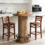 Table de bar ronde ronde avec base en bois de style clôture et repose-pieds en métal