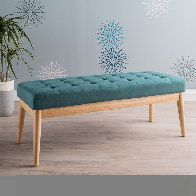 Banc Mid-Century moderne avec repose-pieds capitonné et pieds en bouleau, parfait pour des sièges et un style polyvalents