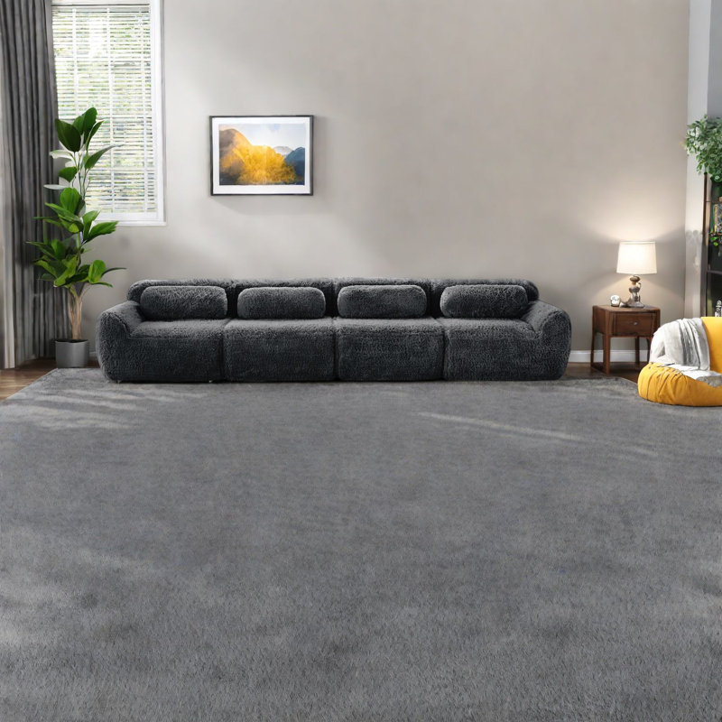 Canapé doux et modulaire, confort en tissu moelleux, conception ergonomique moderne pour la maison