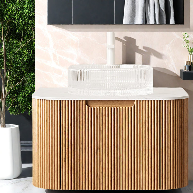 Meuble-lavabo contemporain à grain de bois avec armoire courbée et lavabo en verre