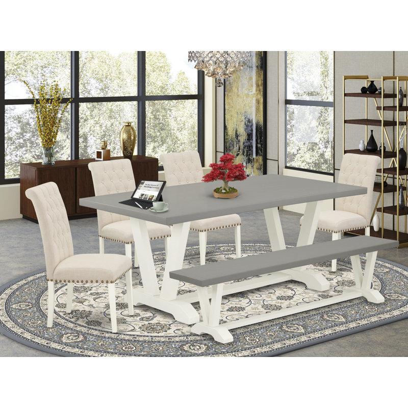 L'ensemble de salle à manger 6 pièces se compose d'une table de cuisine en ciment, d'un petit banc et de 4 chaises rembourrées en tissu de lin beige clair avec dossier capitonné - Lin brossé blanc