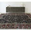 Tapis noir et rouge de haute qualité noué à la main