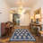Jamie- 4 - Light Iron Tiered Chandelier