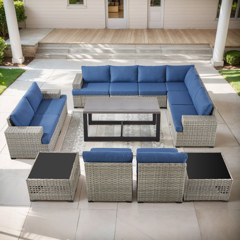 Ensemble de conversation modulaire en rotin et osier avec chaises sans accoudoirs et table basse pour 10 personnes Clute Arnoltice