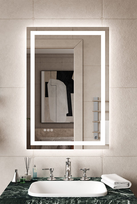 Rectangular wall-mounted bathroom mirror with an integrated LED frame, shown hanging above a green marble vanity with a sink and chrome faucet.