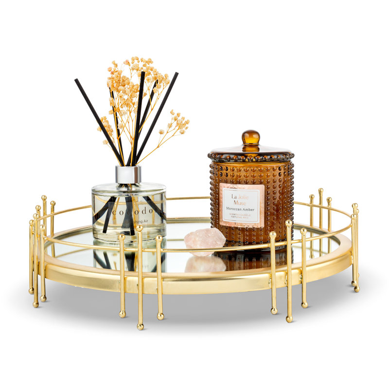 Plateau rond à miroir avec motif symétrique doré
