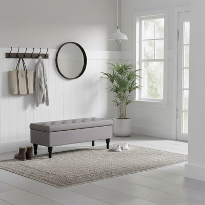 Banc de rangement rembourré en tissu élégant avec pieds en bois massif