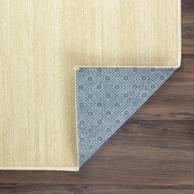 Cream 5' x 7' Washable Non-Slip Synthetic Area Rug