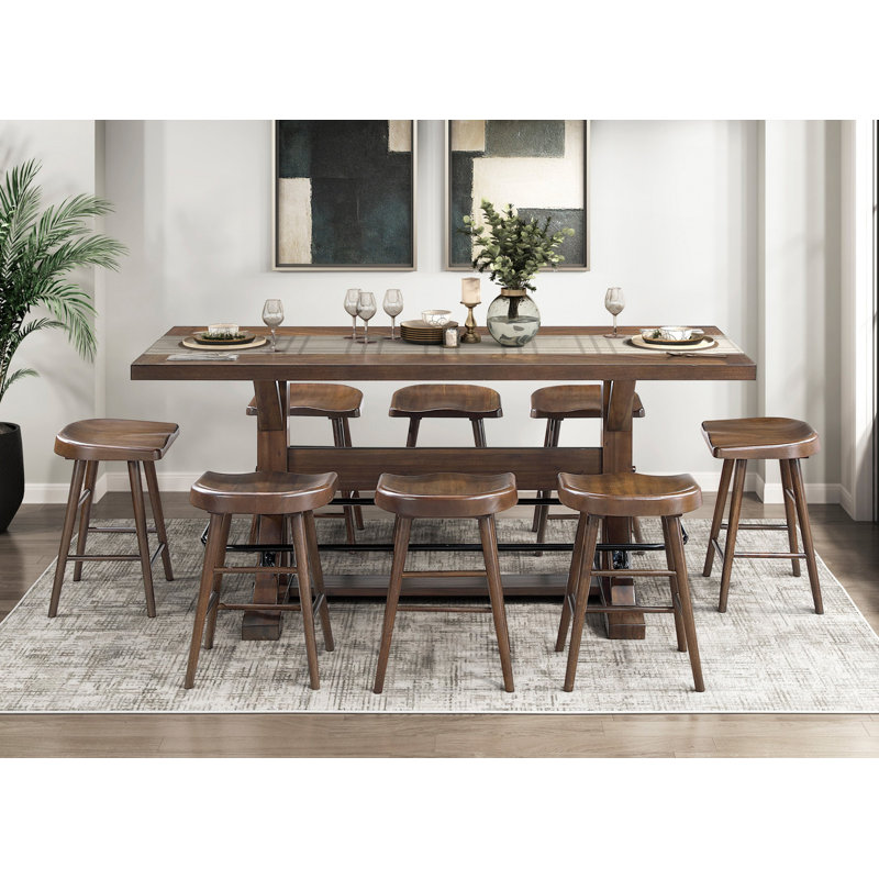 Ensemble de 2 tabourets à hauteur de comptoir à finition brune avec siège en selle et structure en bois robuste au design ergonomique classique
