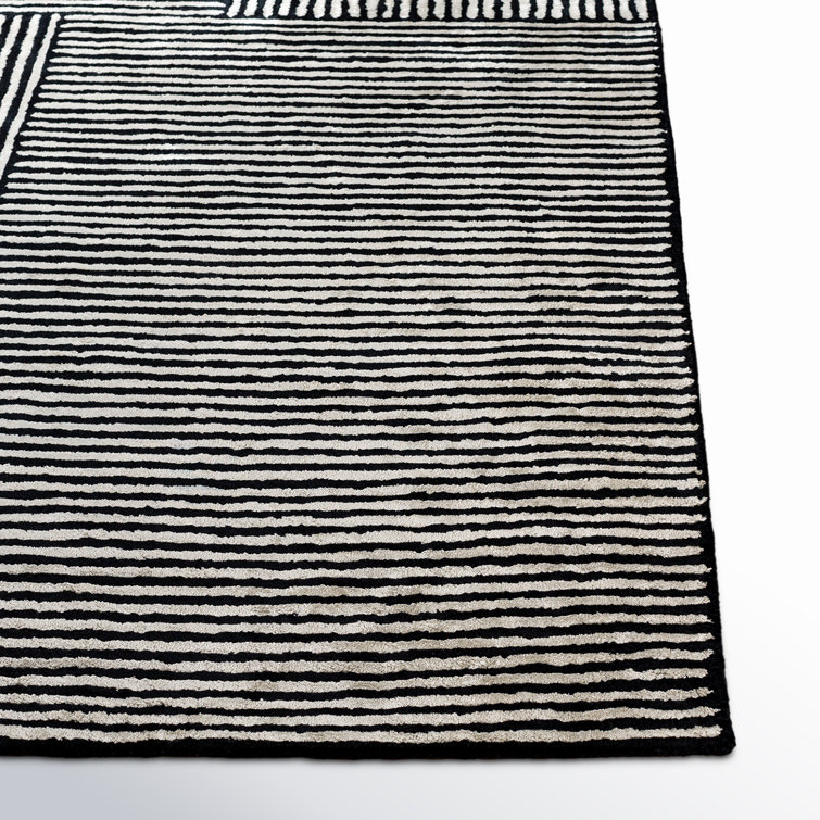 Balos Hand Tufted Black/Ivory Rug