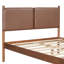 Lit luxueux avec tête de lit en cuir et structure en bois robuste pour un confort ultime