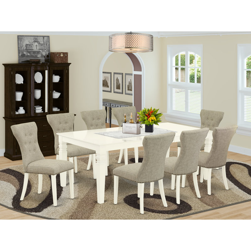 Cet ensemble de salle à manger 9 pièces comprend une table de cuisine rectangulaire avec rallonge papillon et 8 chaises revêtues de tissu de lin, blanc lin