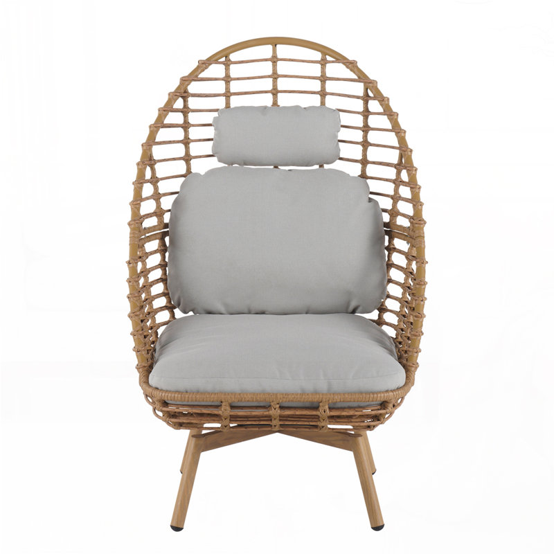 Chaise longue pivotante d'extérieur en osier à haut dossier