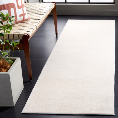 Lukeus Faux Rabbit Fur Performance Machine Washable Solid Color Rug