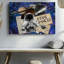 Toile, un collage à thème cosmique vibrant centré sur un art mural noir et blanc, un astronaute dans une combinaison d'espace texturée posée sur un art mural-2138424541