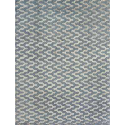 Tapis bleu et ivoire noué à la main de haute qualité