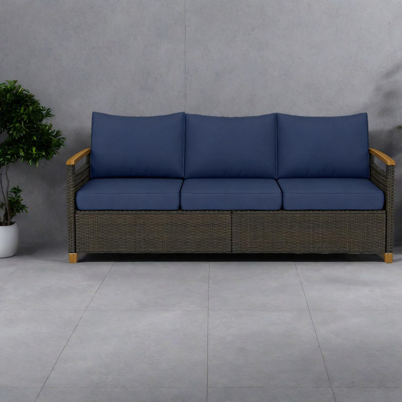 Spacieux canapé de patio moderne, meubles en osier bleu foncé pour une détente en plein air