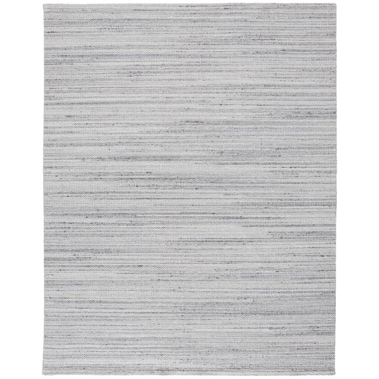 Tapis rectangulaire en laine Naidelyn