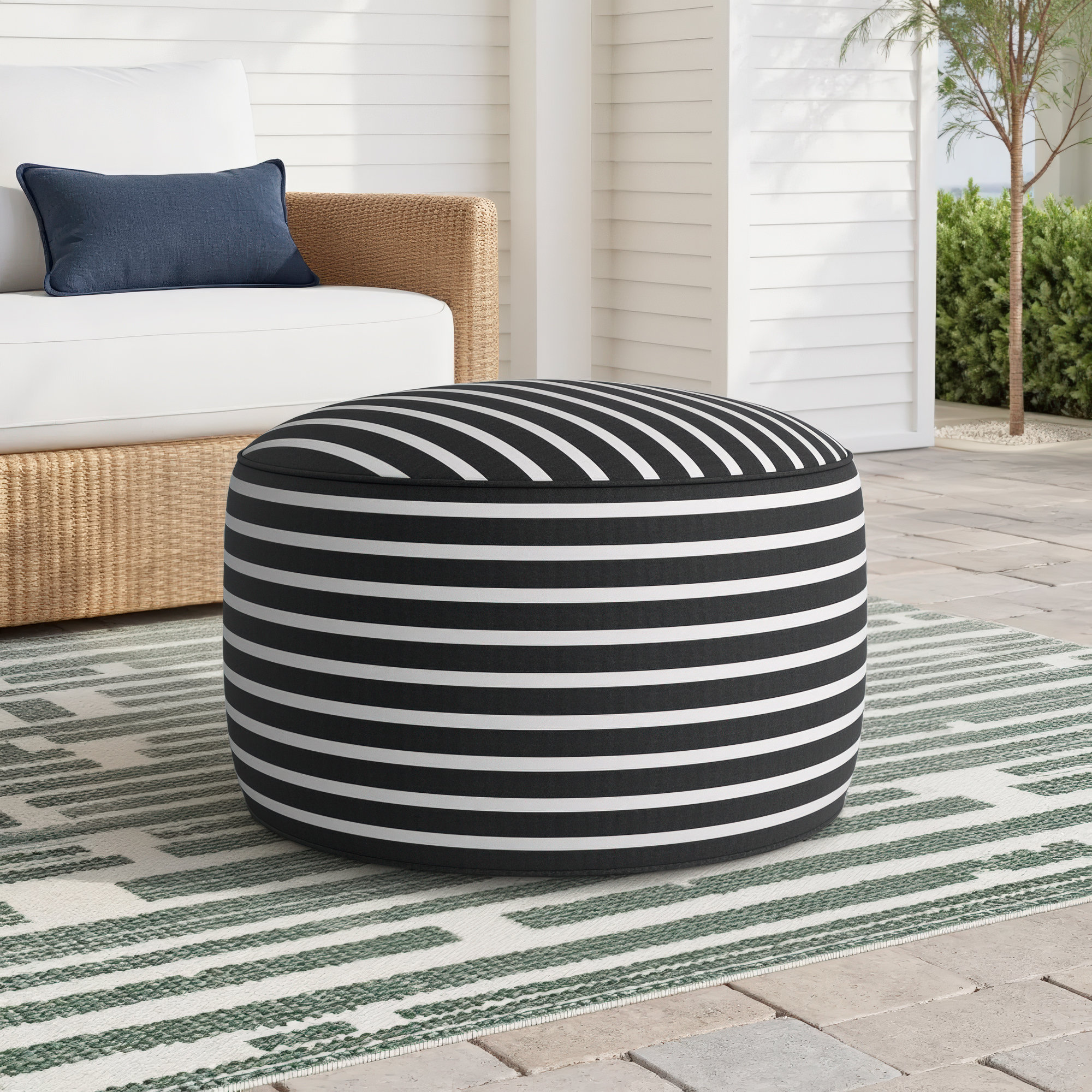 Moseley Round Upholstered Outdoor Ottoman with Sunbrella® Cushion