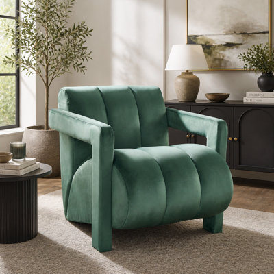 Fauteuil contemporain en velours capitonné, accoudoirs larges, structure en acacia et contreplaqué