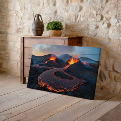 Canvas A Dramatic Volcanic Landscape Under A Twilight Sky Showcasing Multiple Wall Art Erupting Volcanoes With Fiery Lava Spewing From Canvas Wall Art