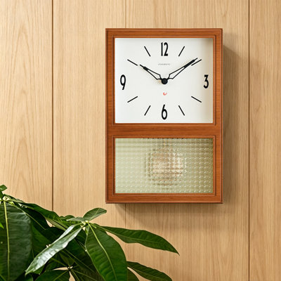 Horloge murale rectangulaire en bois fini noyer