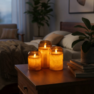 Round Hurricane LED Candles with Mirrored Glass, Moving Wick Flickering Flame, Real Wax Pillars, Battery Operated (Included), Remote & Timer (Set of 3, Gold Tinted Metallic)