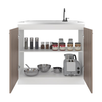 Évier utilitaire avec robinet intégré Napoles et comptoir intégré en acier inoxydable, armoire autoportante à deux portes, poignées en métal et deux tablettes intérieures, espresso clair