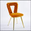 Chaises de salle à manger modernes orange et dorées avec des pieds en fer, des coussins moelleux et un dossier confortable pour divers environnements-662716817-662716816