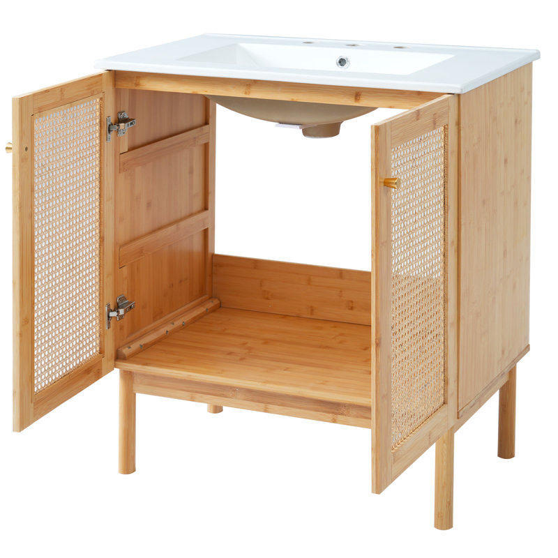 Meuble-lavabo en bambou naturel avec portes en rotin faites à la main et beaucoup de rangement