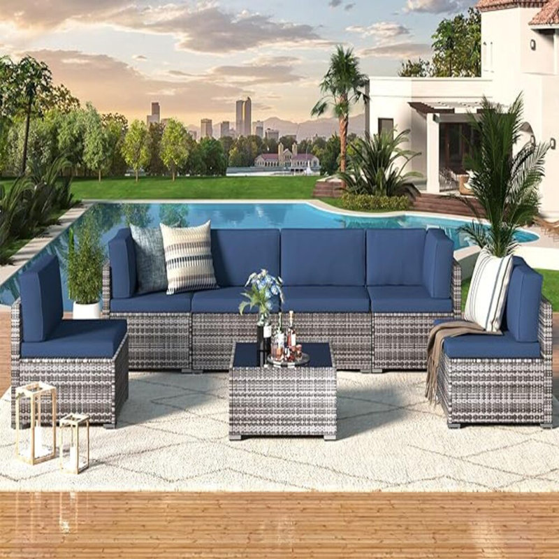Emilienne 7 Piece Rattan Sectional Seating Group with Cushions, Grey, Navy