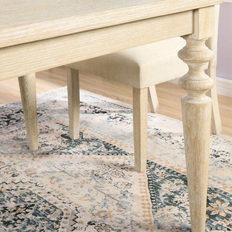 Repas: table rectangulaire avec pieds tournés, 4 chaises bleues et 5 chaises: brun et brun