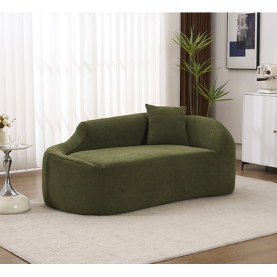 Canapé-lit moderne avec méridienne courbée avec assise profonde et coussin intégré pour le salon ou la chambre à coucher.