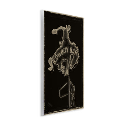 Plaque murale Cowboy Bar sur noir, design par Grotto Studios