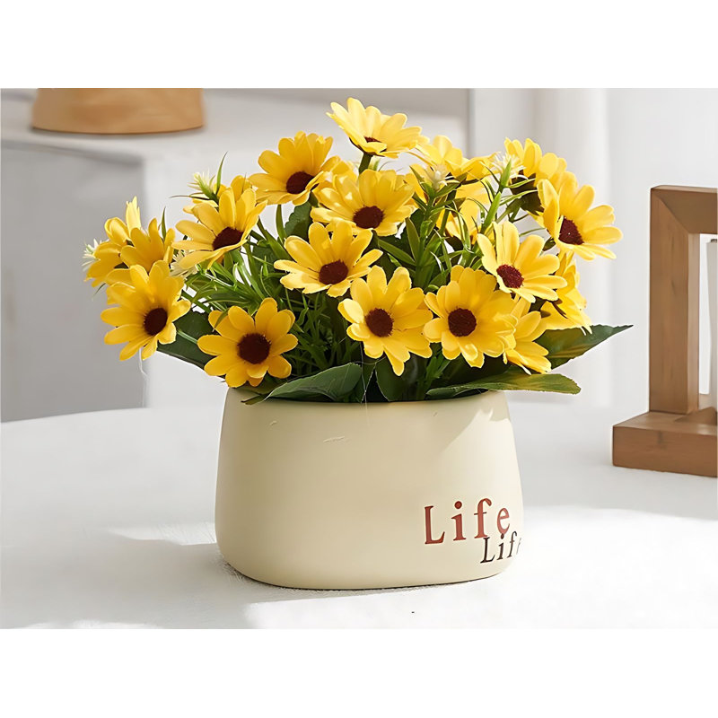 Composition florale artificielle en pot