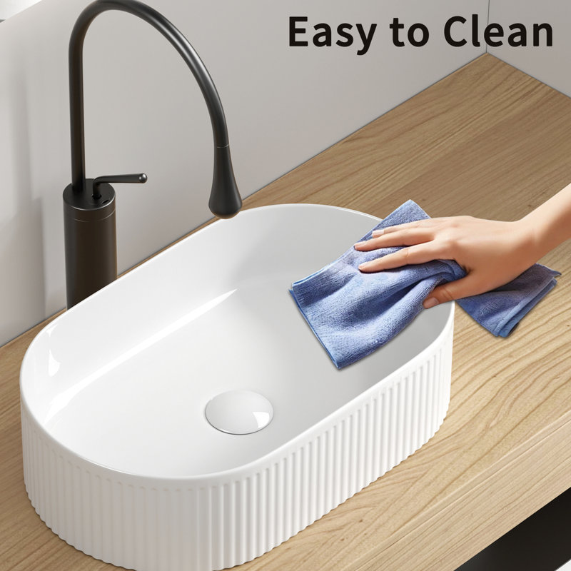 Lavabo de comptoir ovale de 19 à 1/4 de large, cuve en porcelaine blanche de 12 3/8 de profondeur, conception moderne pour salle de bain pratique 19,23 po Profondeur du comptoir 12,0 po de largeur, cuisson à haute température et rayures