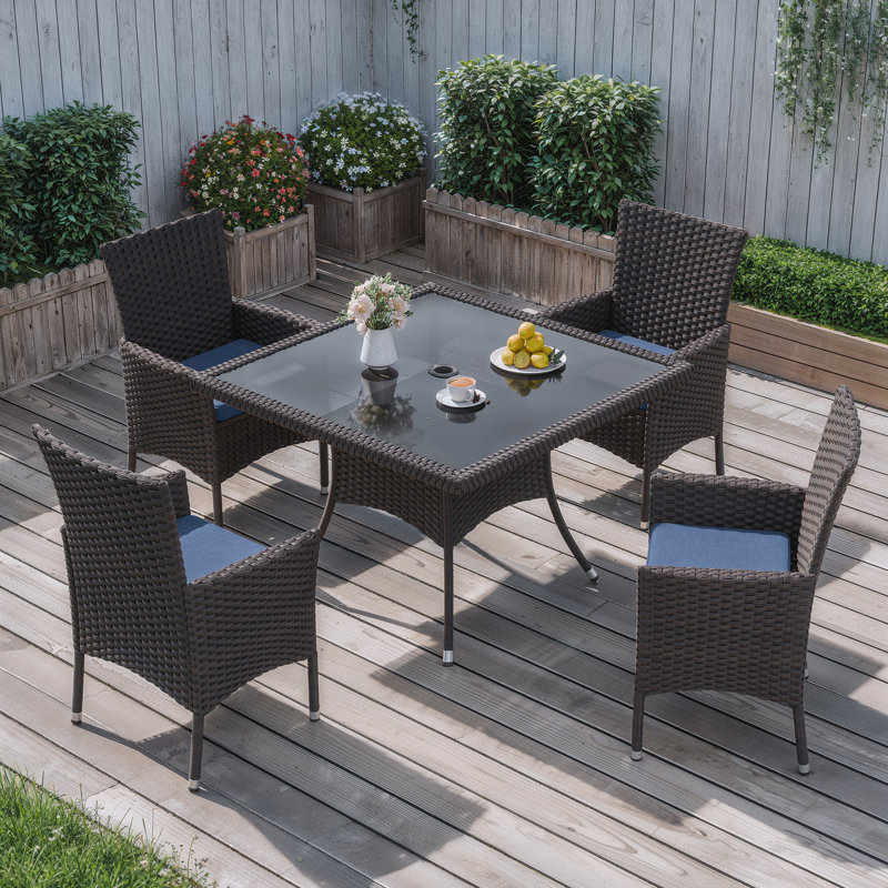 5-Piece Outdoor Rattan Dining Set With Cushions, Armchairs, And Glass-Top Table, Green