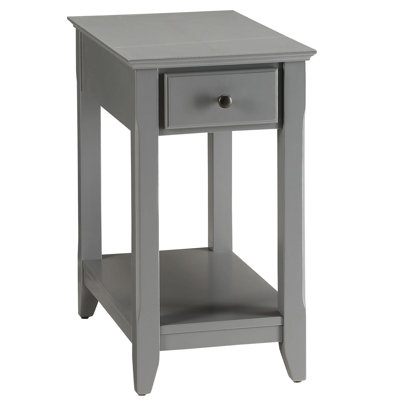 Table rectangulaire grise avec tablette ouverte en dessous du bas pour un pied de rangement inférieur