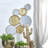 Modern Metal Wall Mirror with Overlapping Circular Design, Textured Iron and Glass Decorative Accent   